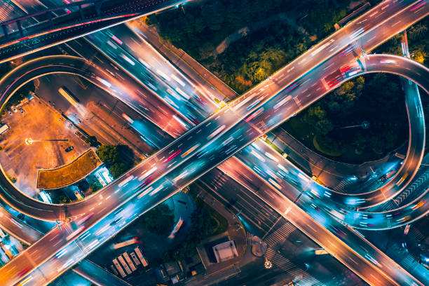 Aerial view of overpass at night Multiple Lane Highway, Overpass, Elevated Road, Road, Road Intersection,infinity symbol overpass road stock pictures, royalty-free photos & images
