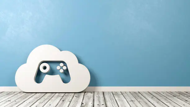 Photo of Cloud Gaming Symbol on Wooden Floor Against Wall