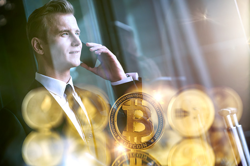 caucasian busine ssman in suit hand smartphone double exposure with cryptocurrency coin symbol business ideas concept