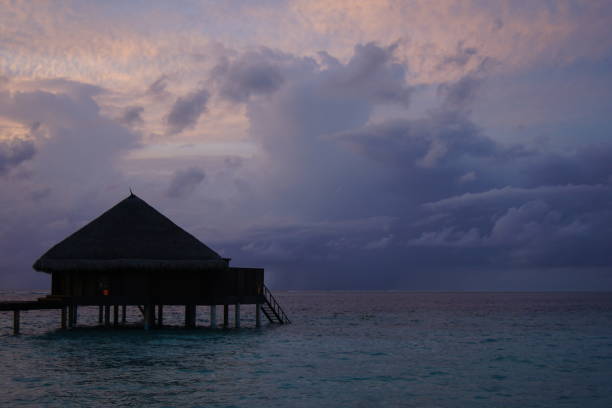 istock Cloudy sky in the evening over the Indian Ocean. Maldives. 1157706092