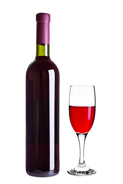istock Glass of red wine and a bottle 115770959
