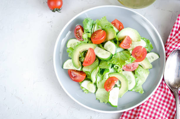 istock Salad with vegetables, greens and sesame 1157711597