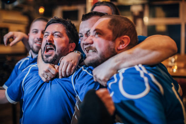 istock Group of men in pub 1157712552
