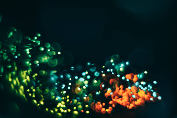 istock Beautiful colored bokeh on a dark abstract background. 1157721694