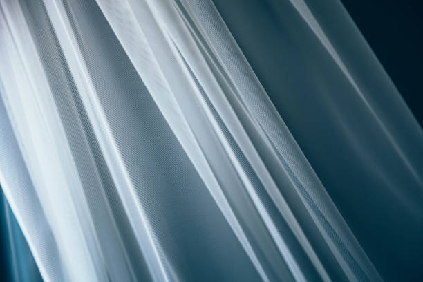 istock Waving White Transparent Curtain Cloth | Soft Natural Light on Fabric Texture 1157722874