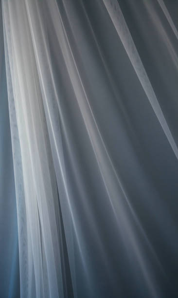 istock Waving White Transparent Curtain Cloth | Soft Natural Light on Fabric Texture 1157722876