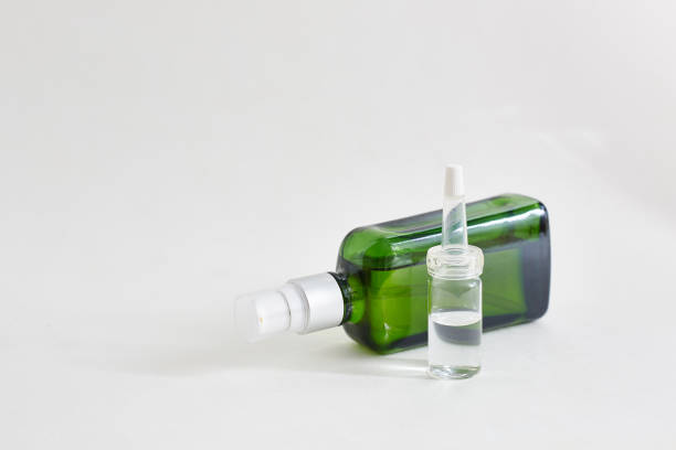 istock Cosmetic bottles of essential oils on white background. Space for text. 1157723216