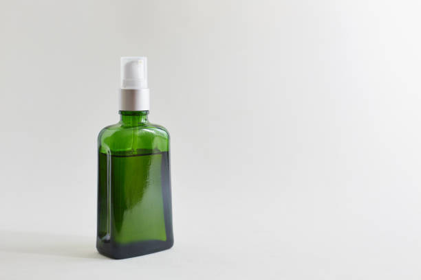 istock Cosmetic bottles of essential oils on white background. Space for text. 1157725638