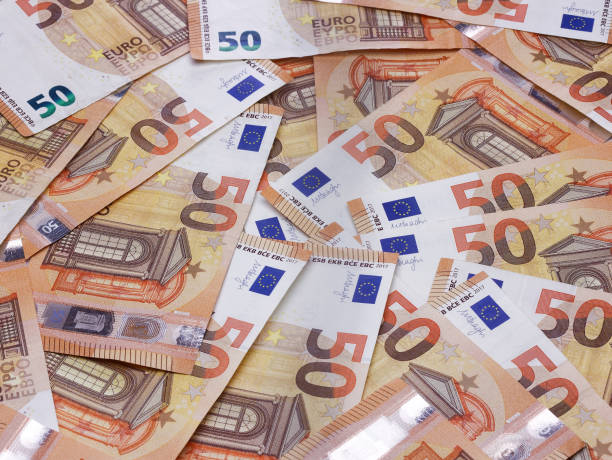 istock 50 euro banknotes or bills carpet background 1157727145