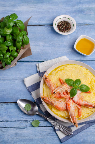 istock Large untreated shrimp with polenta 1157727769