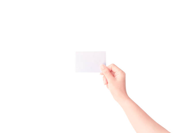 istock Woman hand holding paper isolated on white background 1157727855