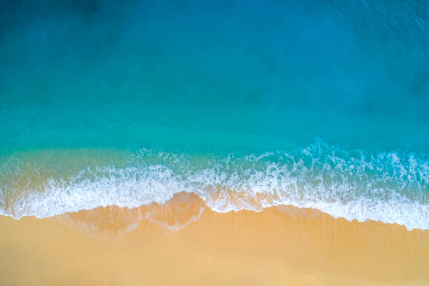 Aerial view of clear turquoise sea and waves Waves and and sandy beach of Kaputaş. aircraft point of view stock pictures, royalty-free photos & images
