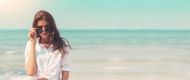 istock Beautiful female model is looking at camera. 1157735041