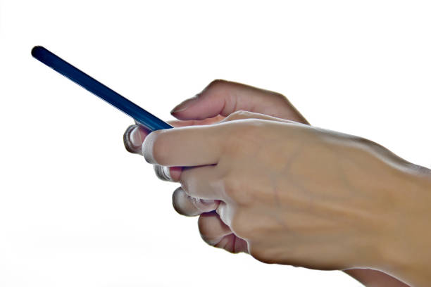 young man taking notes from mobile device
