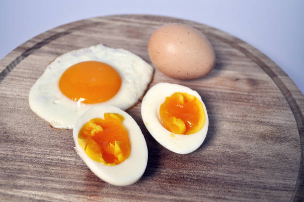 istock different types of eggs - raw, inshell, boiled, fried on a wooden background 1157737857