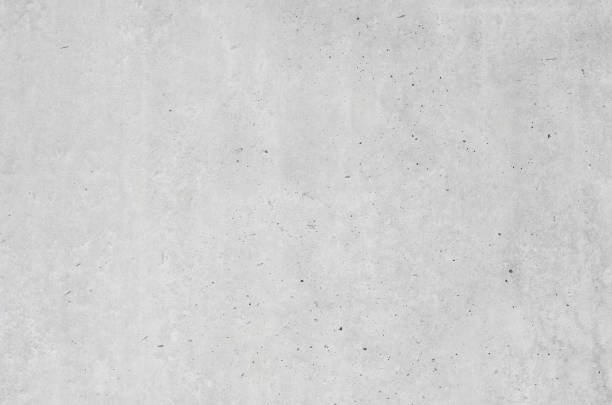 istock gray concrete background texture clean stucco fine grain cement wall clear and smooth white polished grunge interior indoor. 1157738234