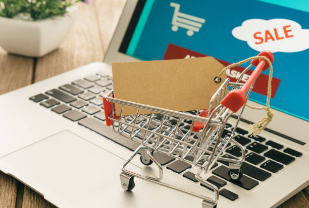 istock shopping carts on a laptop. 1157740038