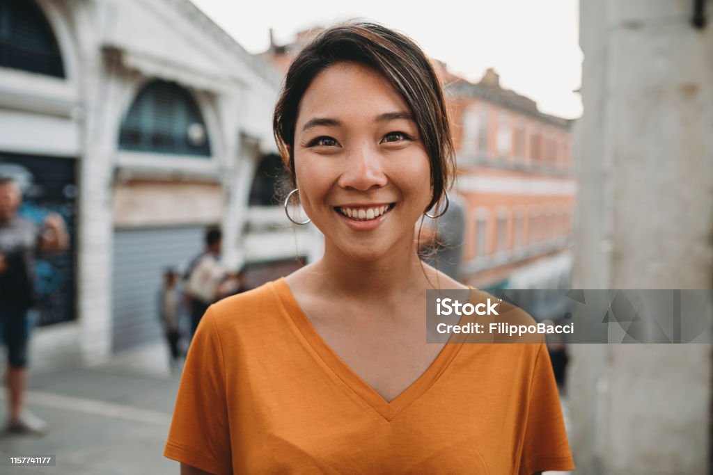 Portrait of a young adult asian woman in Venice Women Stock Photo