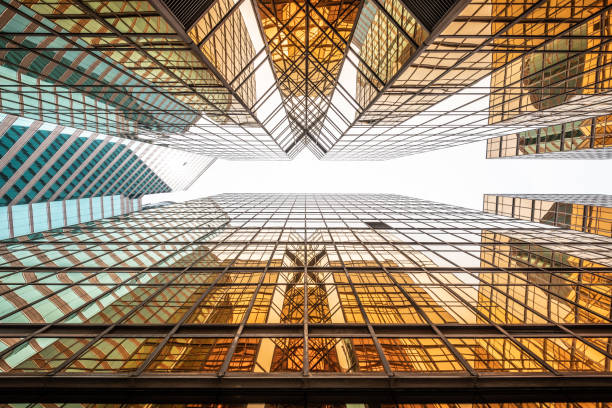 istock Bright future, finance buildings reflecting in each other, seen from below 1157742153