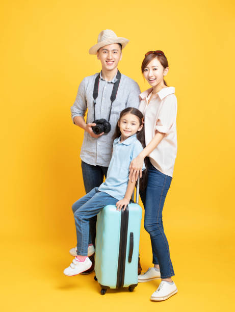 istock happy family with suitcase going on summer vacation 1157742765