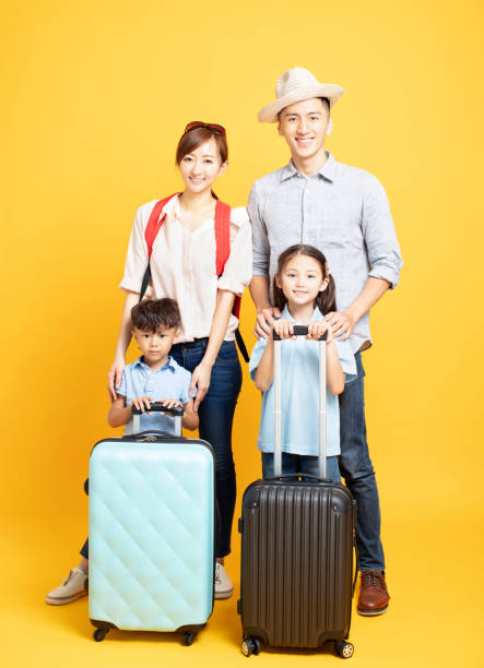 istock happy family with suitcase going on summer vacation 1157742773