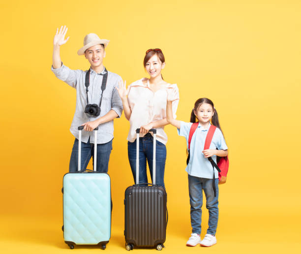 istock happy family with suitcase going on summer vacation 1157742797