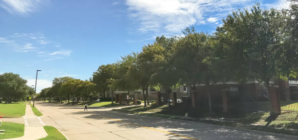 istock Panoramic three stories and multiple units apartment complex near street suburbs Dallas, Texas 1157745109