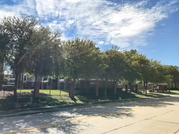 istock Three stories and multiple units apartment complex near street suburbs Dallas, Texas 1157745122