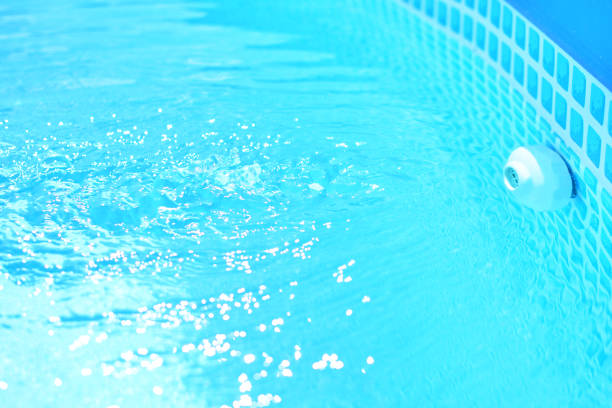Pool filling with fresh and clean blue water.