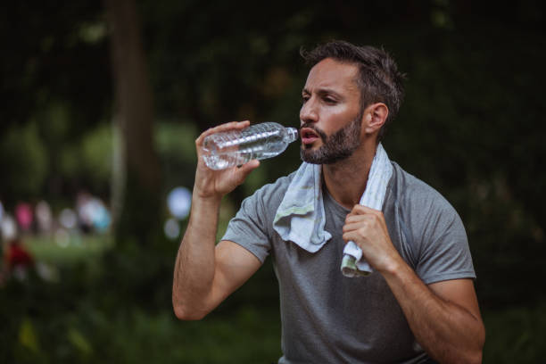 istock Man resting after running in nature 1157745291