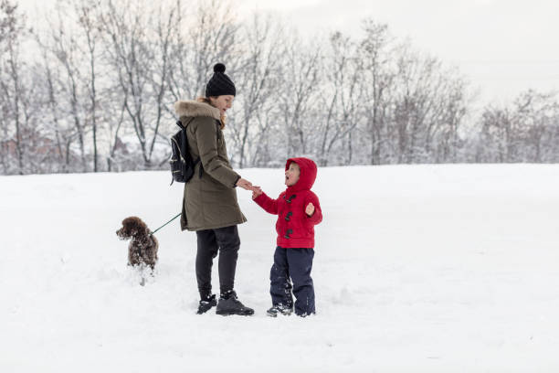 istock Happy young family on a fresh snow day 1157747265