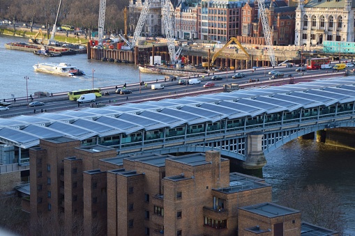 London, United Kingdom - March 4 2019: Blackfriars Bridge Thames river city aerial view travel holiday transport traffic cityscape