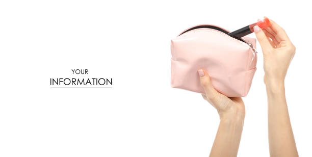 istock Pink cosmetic bag in hand beauty pattern 1157748302