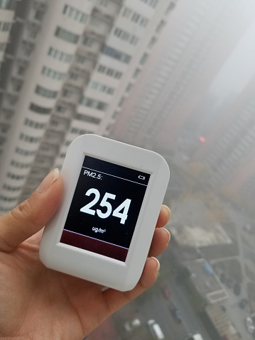 Measure outdoor air quality. Handheld particulate 2.5 (pm.2.5) sensor. Harmful small dust detector