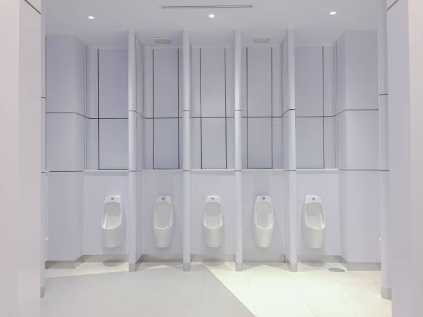 istock White toilet urinal in modern restroom,new lavatory with ceramic style 1157750129