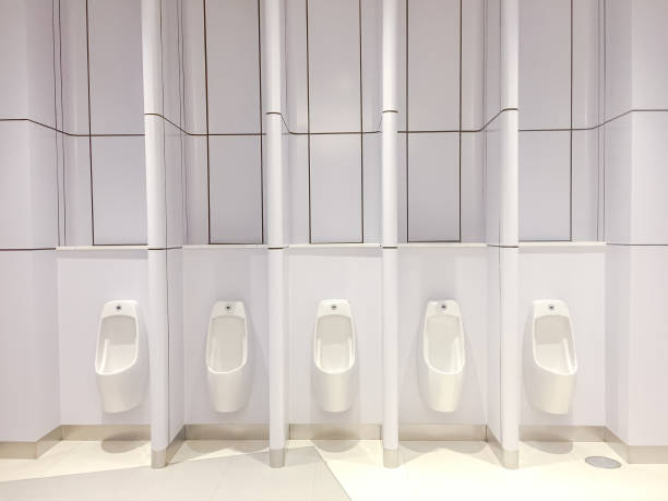 istock White toilet urinal in modern restroom,new lavatory with ceramic style 1157750135