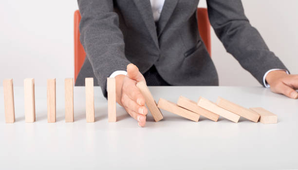 istock Businesswoman pointing at risk management concept on screen 1157758015