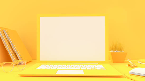 istock Yellow laptop mock-up on Work desk with yellow background. 1157760522