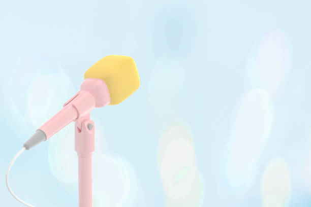 istock Microphone yellow pink pastel color 1157760523