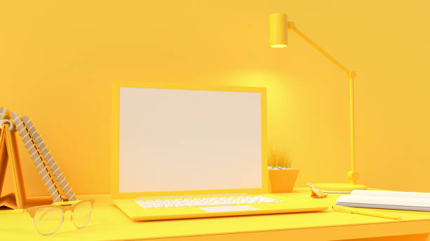 istock Yellow laptop mock-up on Work desk 1157760539