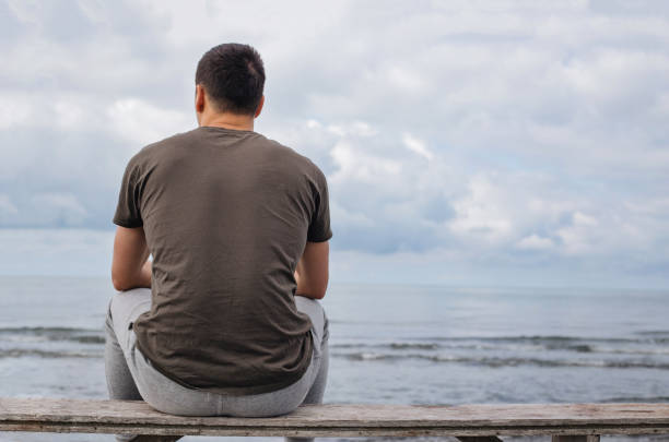istock Man sitting and enjoying the view 1157765132