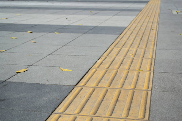 istock Tactile paving on footpath for blind pedestrians 1157765501