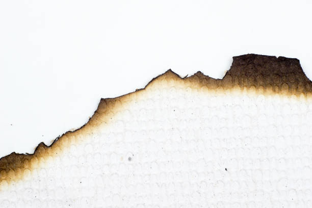 istock paper burned old grunge abstract background texture 1157765600