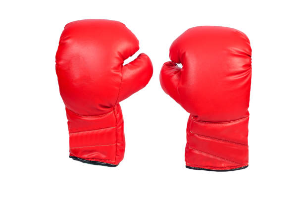 istock Pair of red leather boxing gloves or mitt isolated on white background. 1157768218