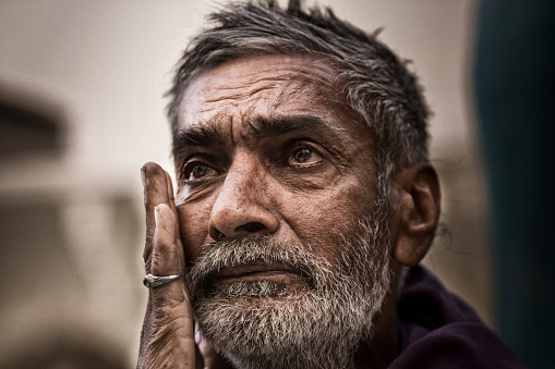 PUSHKAR, INDIA -APRIL 09, 2016: Unidentified Emotional Rural Man Crying and love to pose, about 32.7% percent of Indians are extremely poor yet, Pushkar India, April 09, 2016