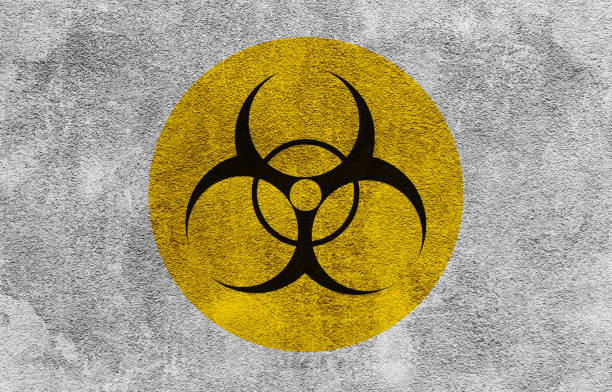 istock Biological hazard sign painted on gray concrete wall 1157770811