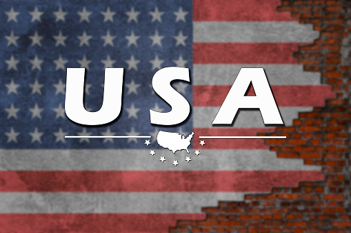 Large, white letters on a blurred background with the image of the American flag