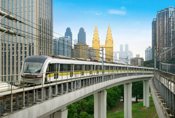 istock the light rail train shuttles through the city. 1157772744