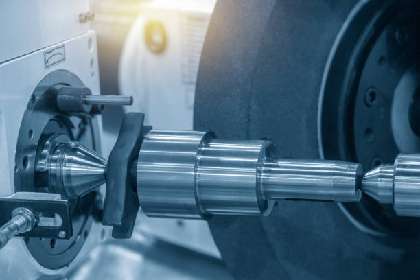 istock The cylindrical grinding machine with steel shaft. 1157773429