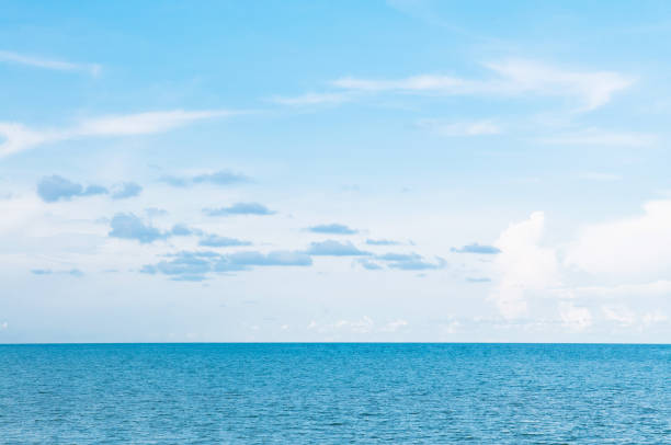 istock Empty vast blue tropical ocean seascape horizon and clear sky slightly clouds on summer day 1157774305